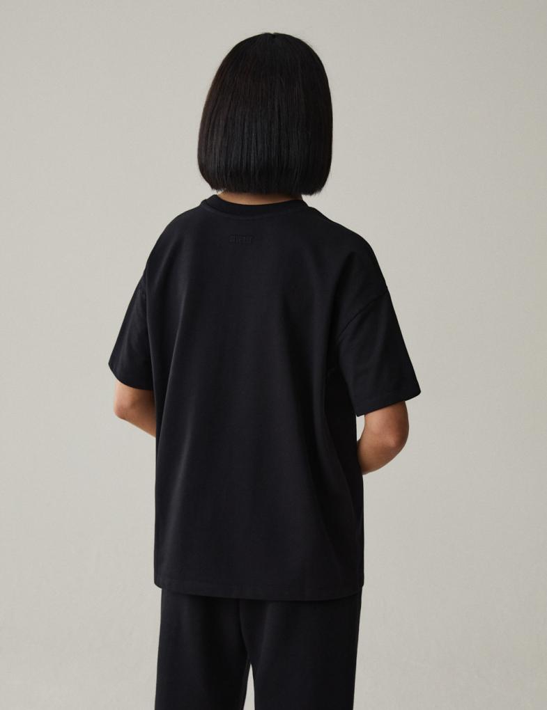 Жіноча футболка оверсайз з принтом збоку чорна - Зображення 3